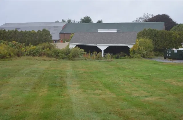 an aerial view of residential house with outdoor space