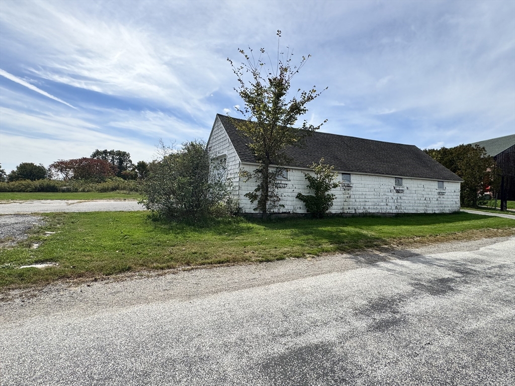 75 Potter Hill Road Grafton, MA 01519 - Photo 4 of 9 a view of a house with a yard