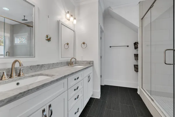 a bathroom with a bathtub and a shower
