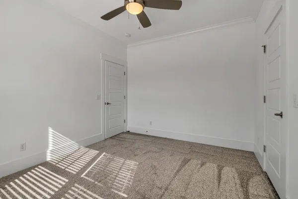 a room with a table and chairs