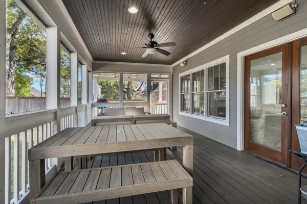 a view of a porch with furniture