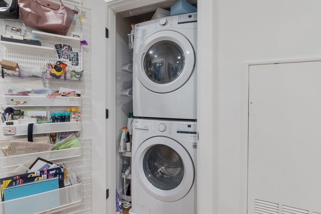 202 Maverick Street, Unit 301 Boston, MA 02128 - Photo 20 of 28 a utility room with dryer and washer
