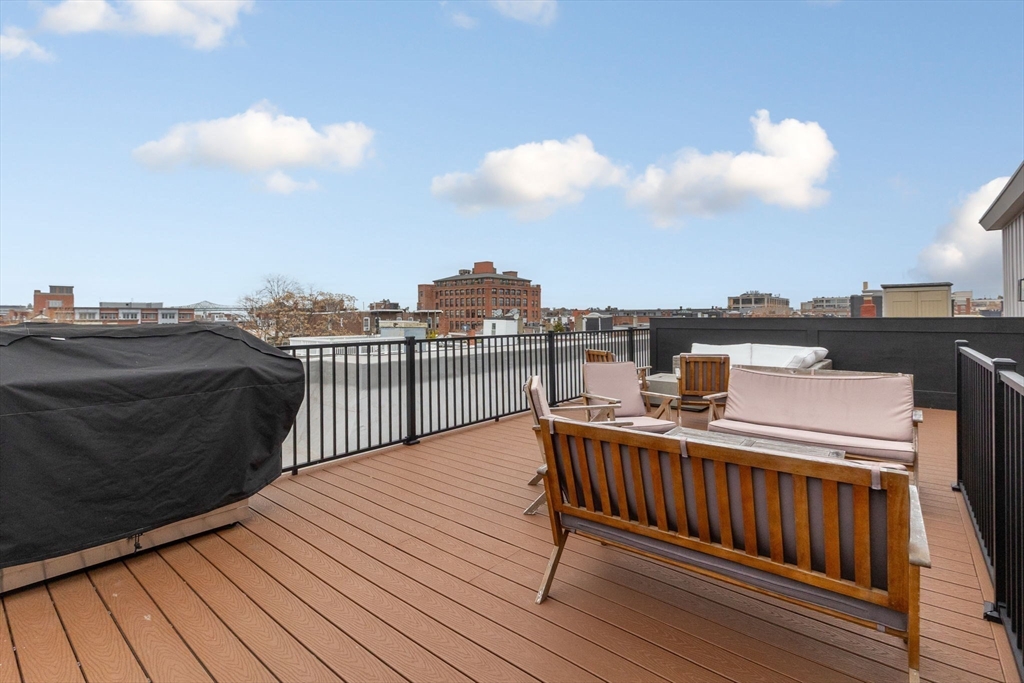 202 Maverick Street, Unit 301 Boston, MA 02128 - Photo 21 of 28 a view of roof deck with patio