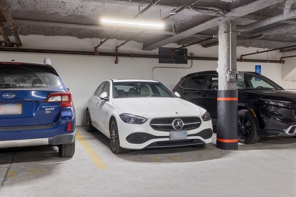 202 Maverick Street, Unit 301 Boston, MA 02128 - Photo 24 of 28 a car parked in a garage