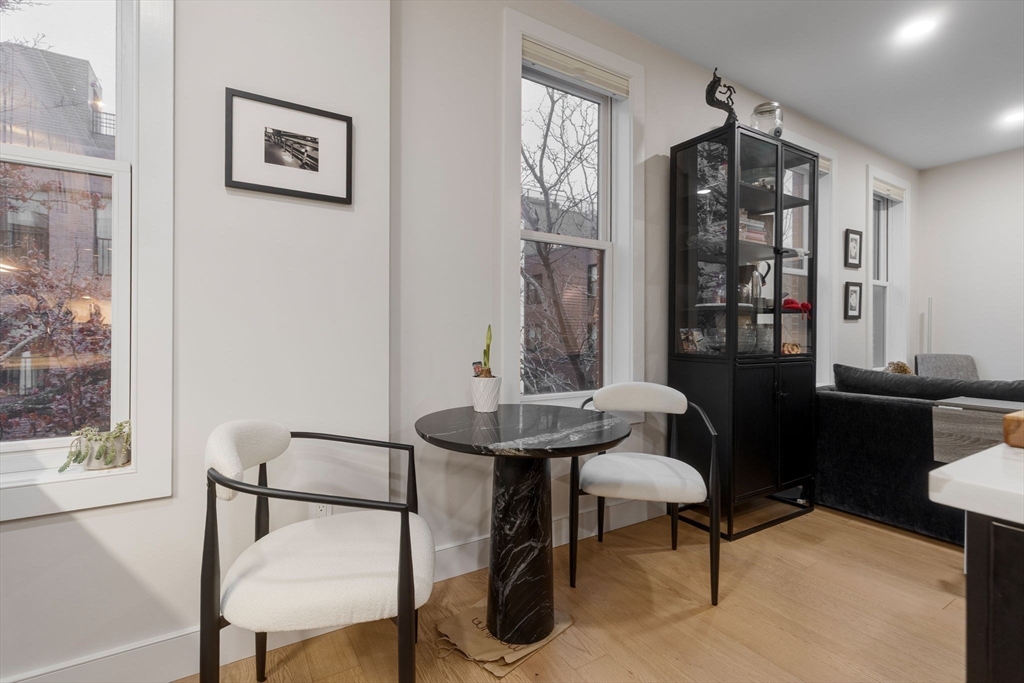 202 Maverick Street, Unit 301 Boston, MA 02128 - Photo 8 of 28 a view of a room with furniture and window