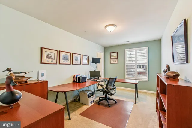 a room with furniture and a lamp