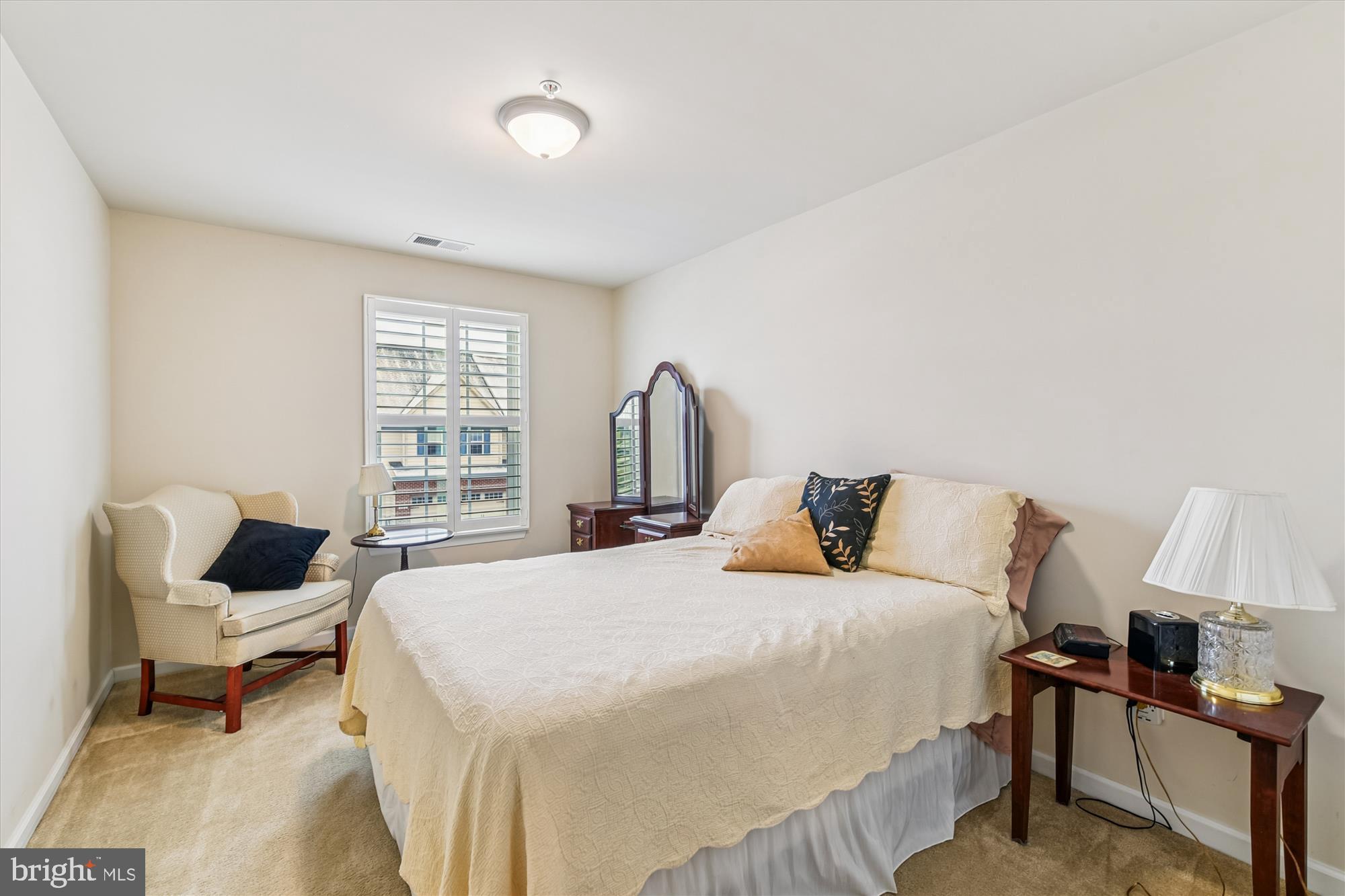 320 Lennox Drive Fallston, MD 21047 - Photo 29 of 46 a bedroom with a bed and a chair