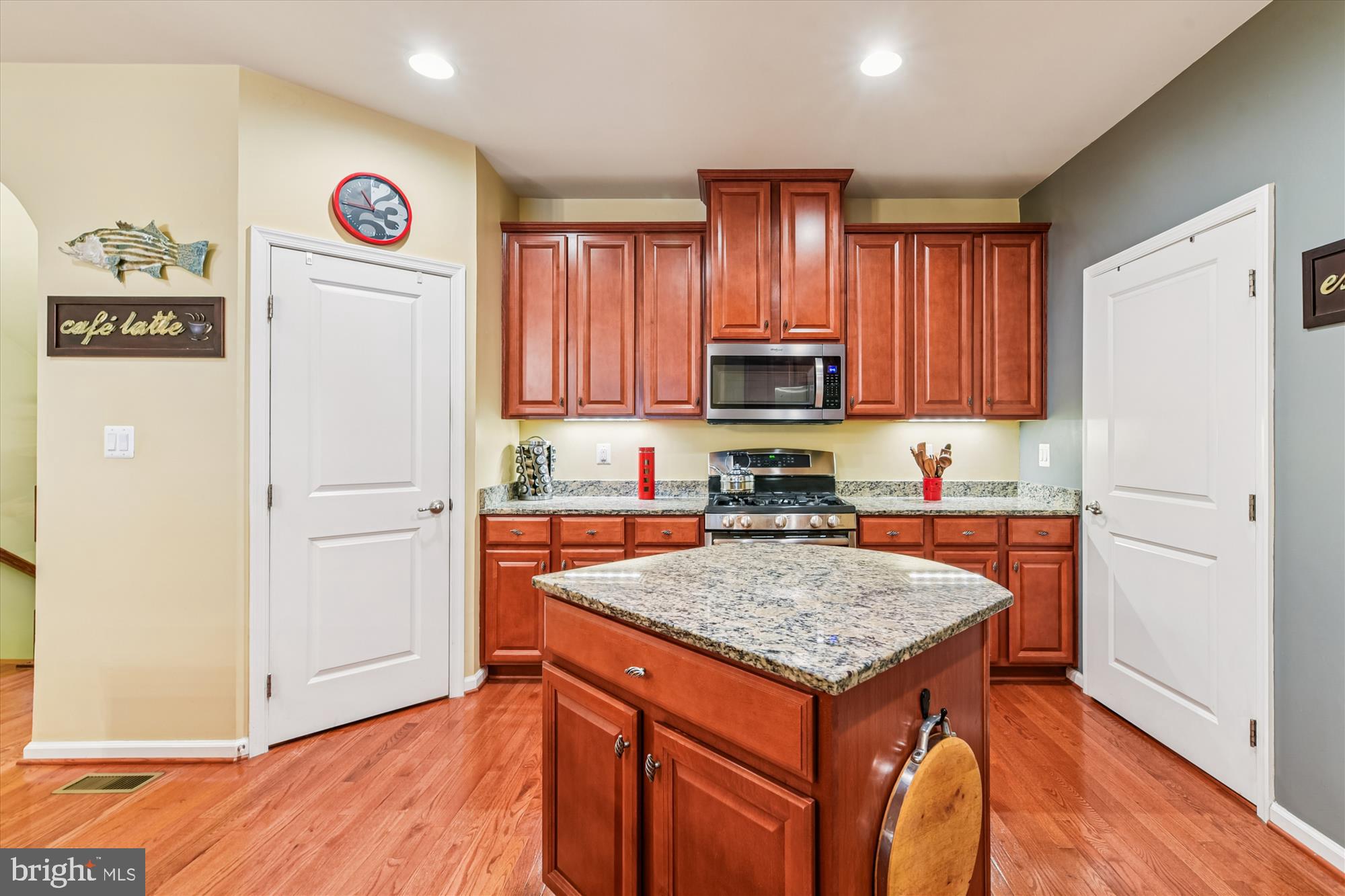 320 Lennox Drive Fallston, MD 21047 - Photo 7 of 46 a kitchen with granite countertop a refrigerator and a stove top oven
