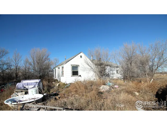 a black and white photo of a house