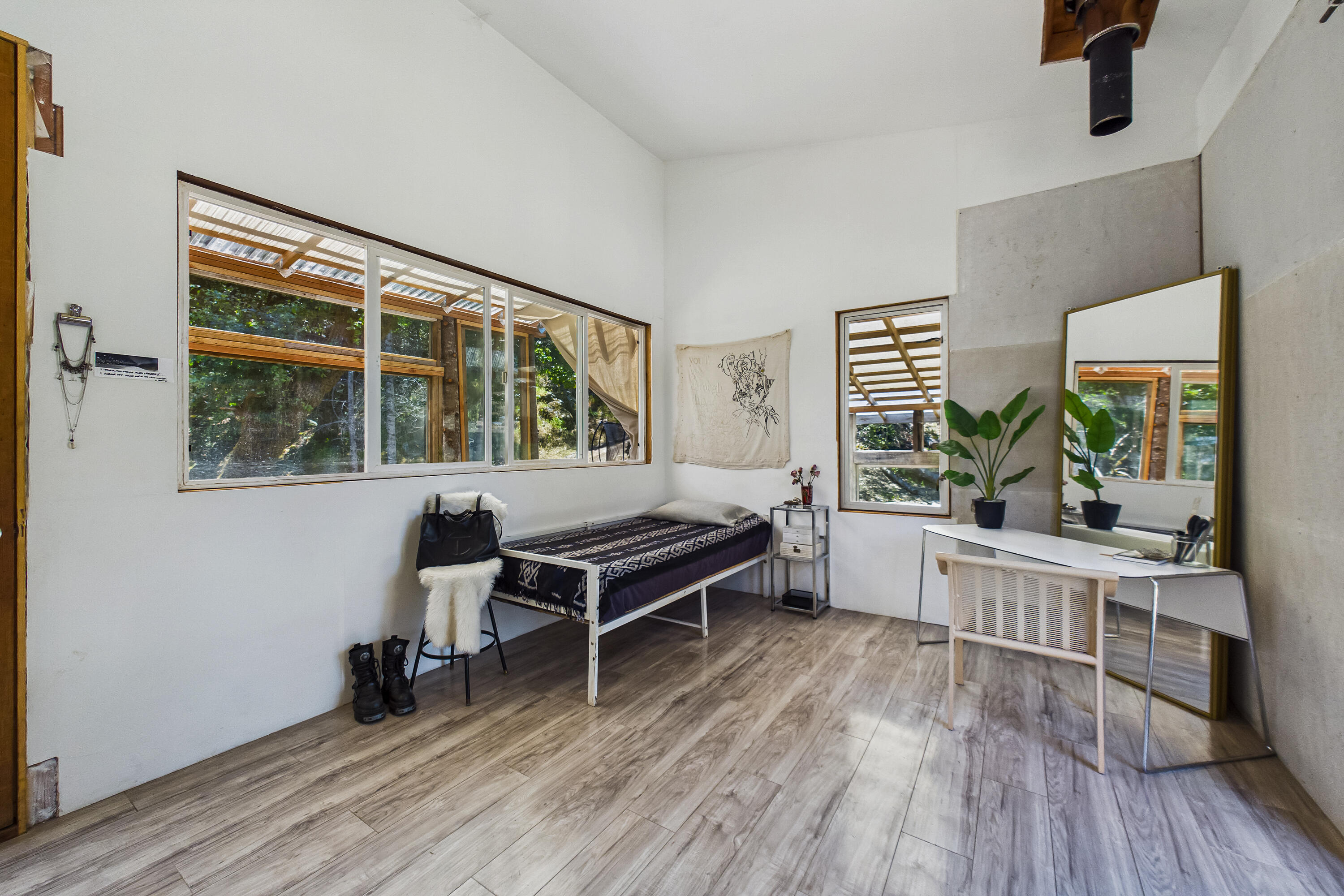 60890 Bell Springs Road Laytonville, CA 95454 - Photo 12 of 77 a bedroom with furniture and windows