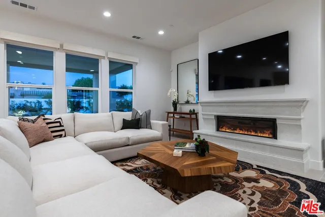 a kitchen with a table and chairs in it