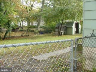 419 Crown Road Eden, MD 21826 - Photo 3 of 3 a backyard of a house with a yard and outdoor seating