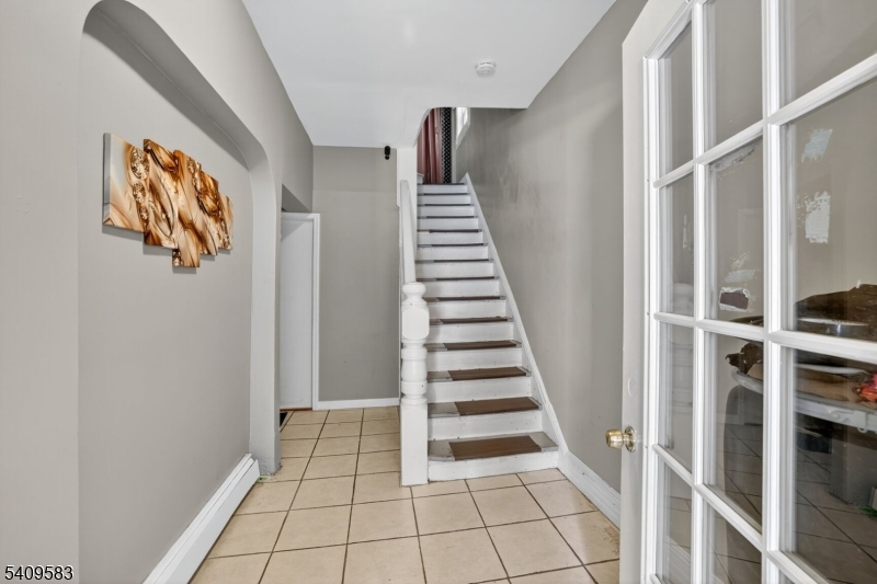 186 3rd Street, Unit 1 Newark, NJ 07107 - Photo 2 of 25 a view of an entryway with staircase