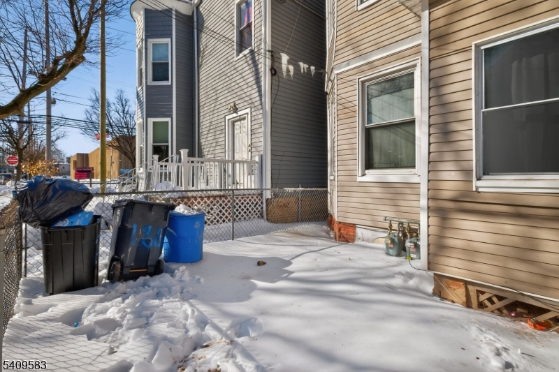 186 3rd Street, Unit 1 Newark, NJ 07107 - Photo 23 of 25 a view of a house with a patio