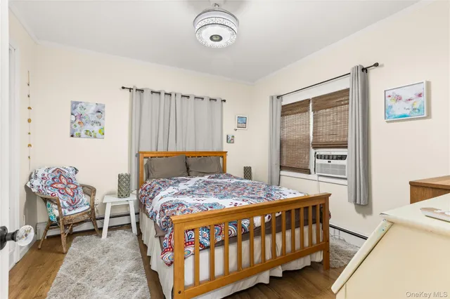 a bedroom with a bed and a table in it