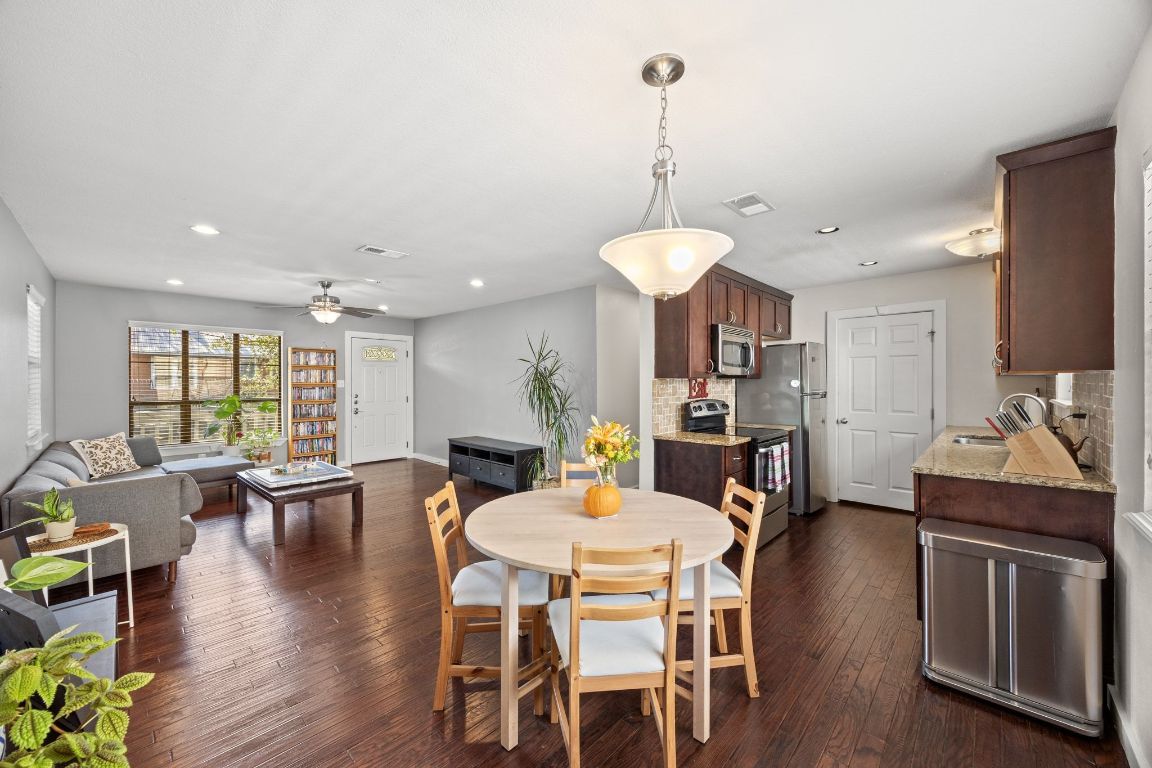 5500 Evans Avenue Austin, TX 78751 - Photo 13 of 27 a view of a dining room with furniture window and wooden floor