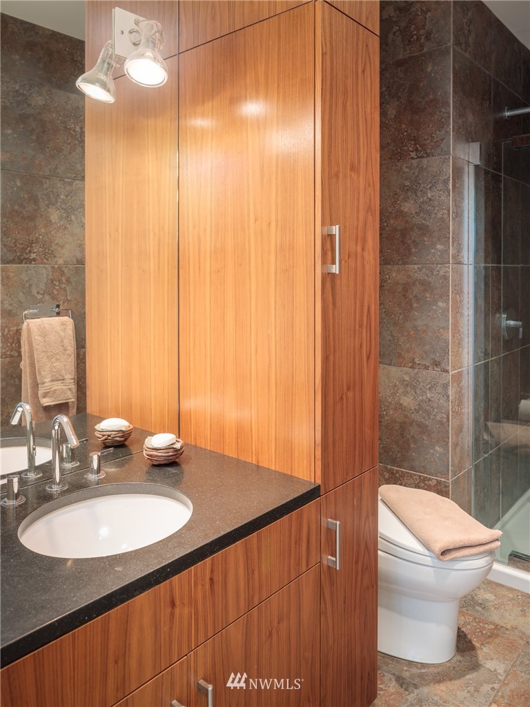 209 Hodgson Road Lopez Island, WA 98261 - Photo 11 of 20 a bathroom with a sink and a mirror