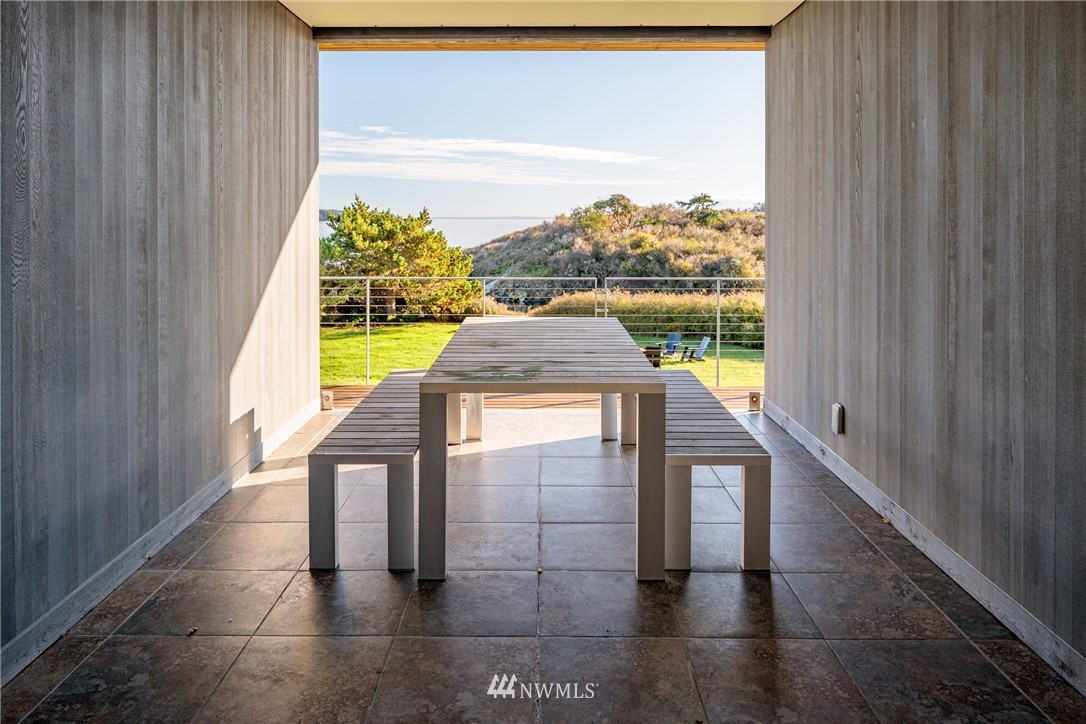 209 Hodgson Road Lopez Island, WA 98261 - Photo 12 of 20 a view of entryway with a floor to ceiling window and outdoor view