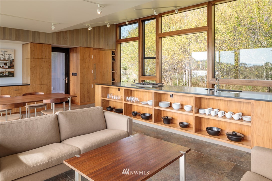 209 Hodgson Road Lopez Island, WA 98261 - Photo 7 of 20 a living room with furniture and a large window