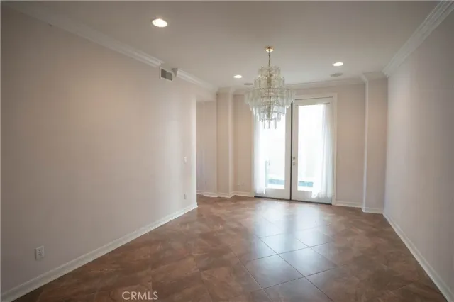 a kitchen with granite countertop a sink and a window