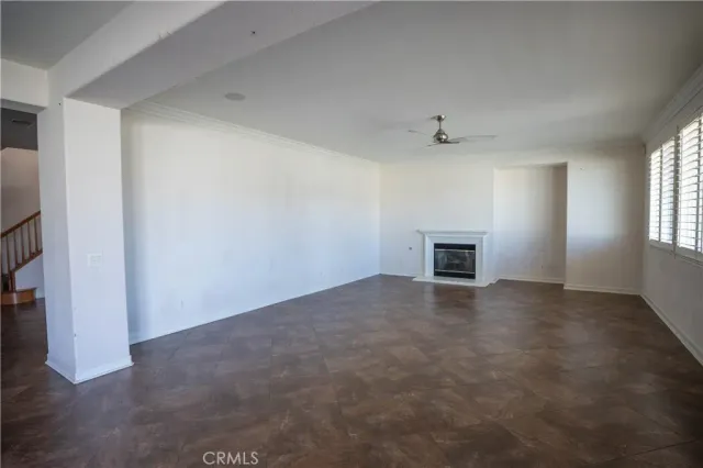 a view of storage and utility room with a window