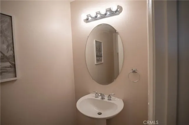 a bath tub sitting in a bathroom next to a window