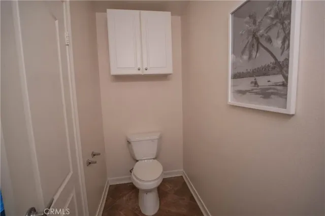 a spacious bathroom with a tub shower and sink