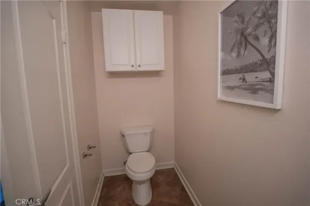 a spacious bathroom with a tub shower and sink
