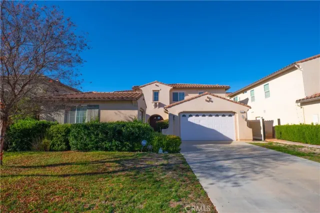 a front view of a house with basket ball court