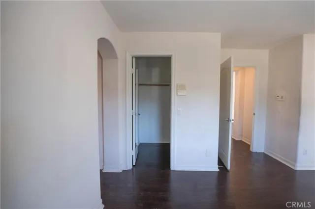 a bathroom with a toilet and a bathtub