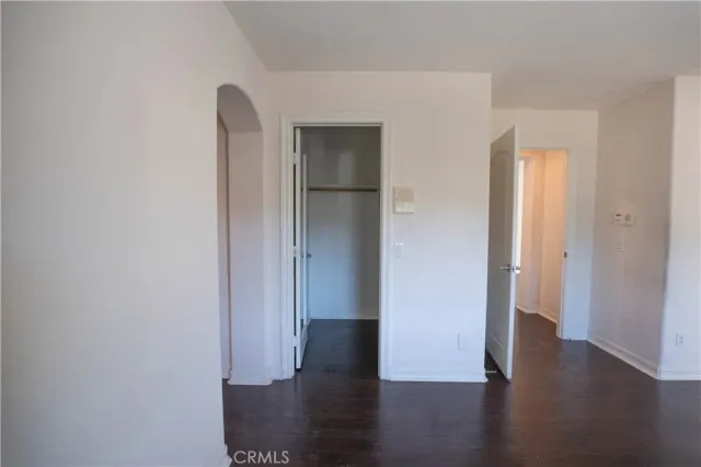 a bathroom with a toilet and a bathtub