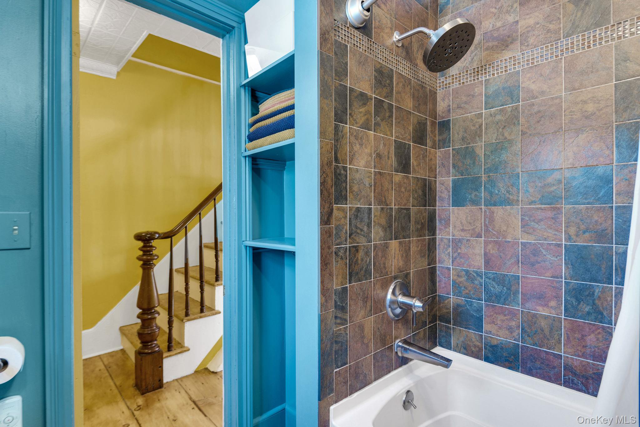 46 Union Street Montgomery, NY 12549 - Photo 14 of 38 a bathroom with a bathtub and shower