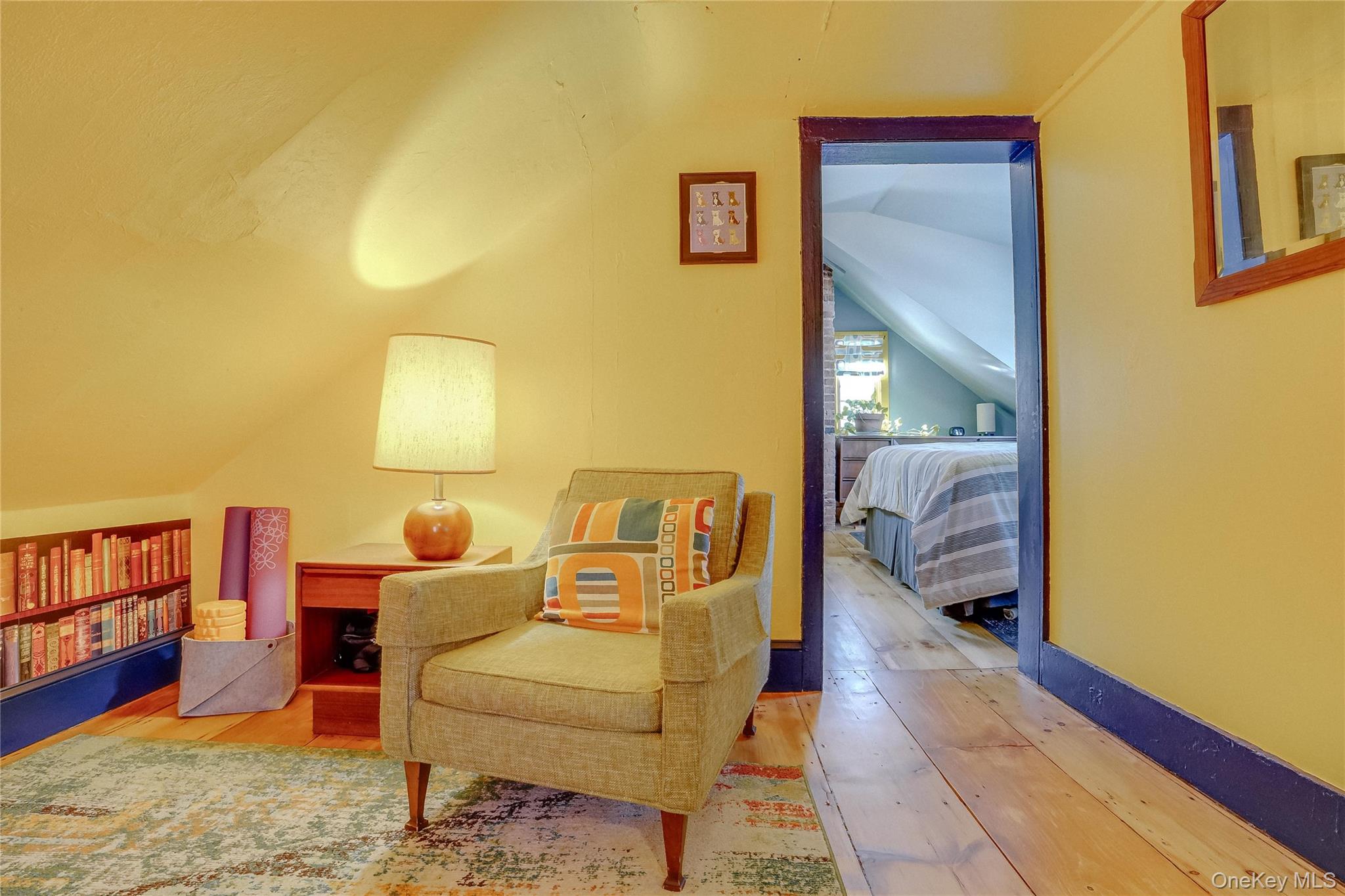 46 Union Street Montgomery, NY 12549 - Photo 17 of 38 a living room with furniture and a wooden floor