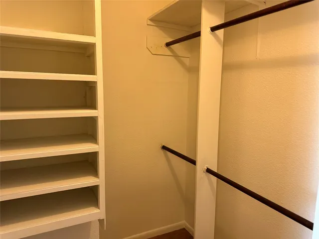 a view of a walk in closet