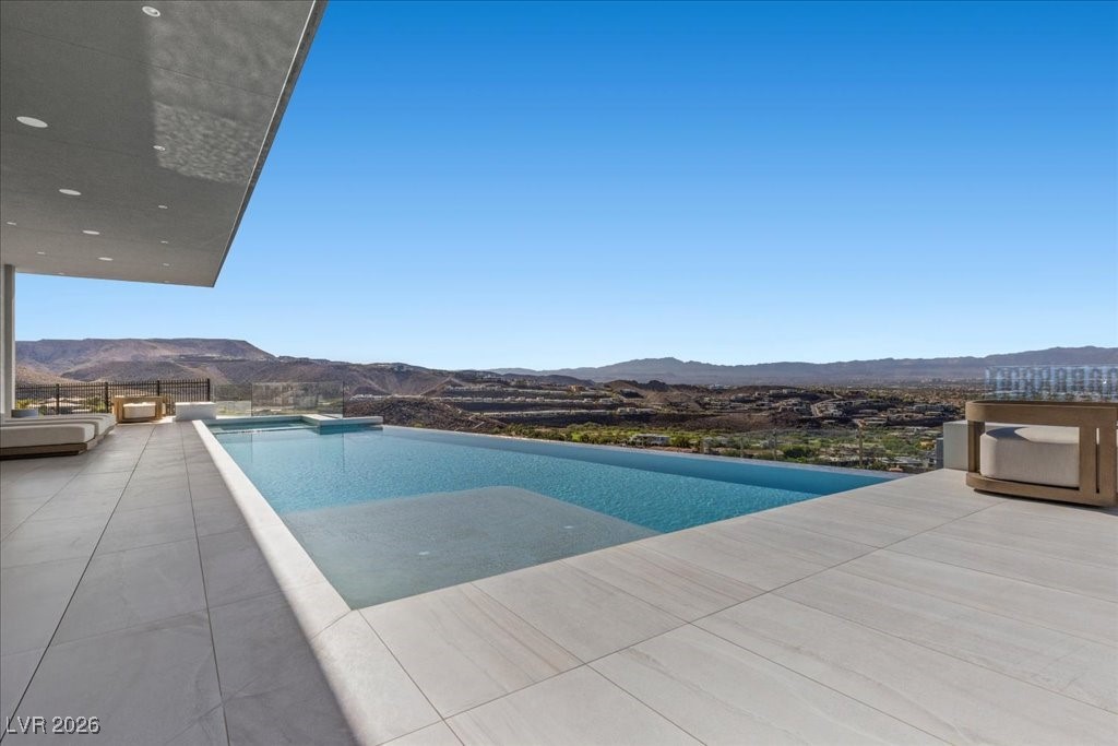 615 Scenic Rim Drive Henderson, NV 89012 - Photo 56 of 75 Patio area off the primary bedroom