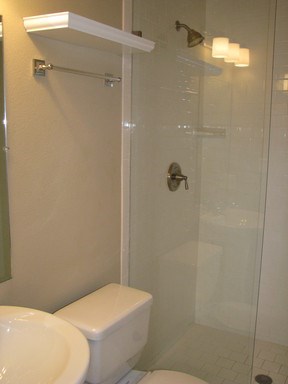 907 West 30th Street, Unit B Austin, TX 78705 - Photo 16 of 20 a bathroom with a toilet and shower
