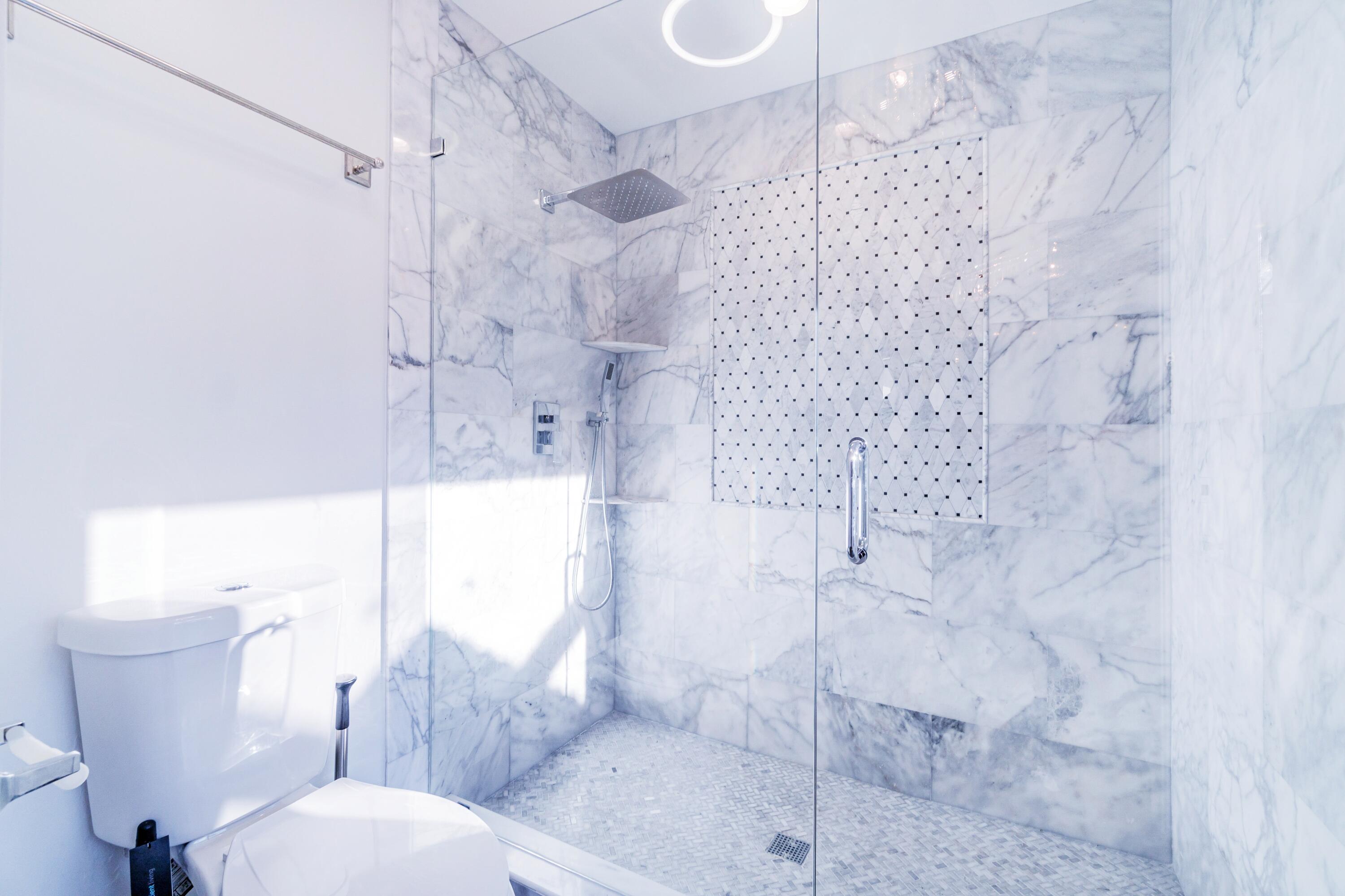 1350 Longlea Terrace Wellington, FL 33414 - Photo 33 of 61 a bathroom with a toilet and shower