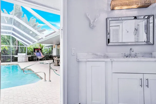 a bedroom with a bed and a television