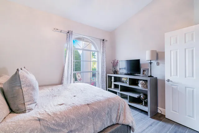 a view of a patio with a table and chairs