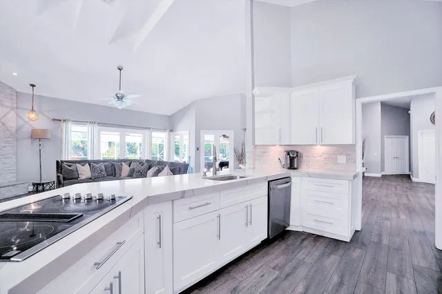 a front view of building with yard and green space