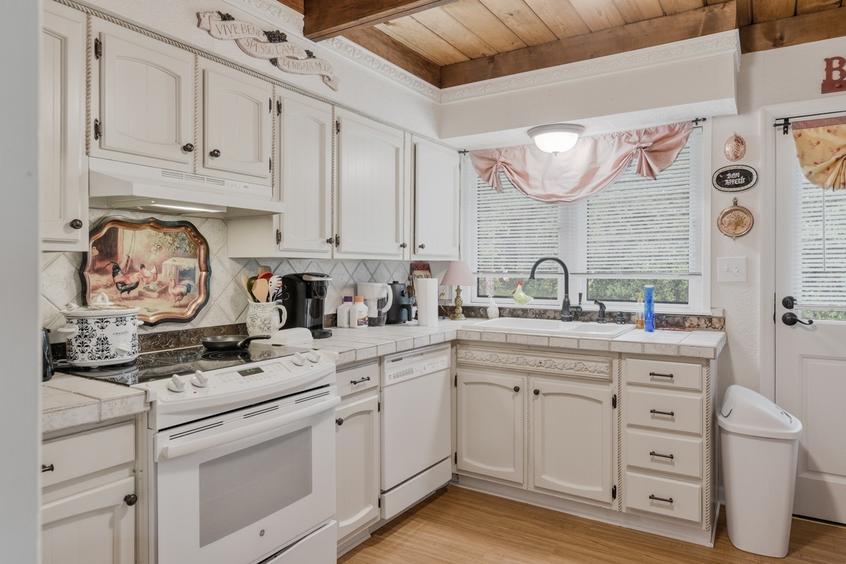 205 Allen Road Goodlettsville, TN 37072 - Photo 18 of 43 a kitchen with stainless steel appliances granite countertop a sink and cabinets