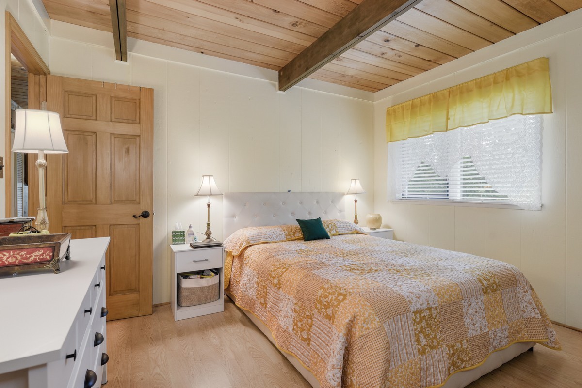 205 Allen Road Goodlettsville, TN 37072 - Photo 29 of 43 a bedroom with a bed and a lamp