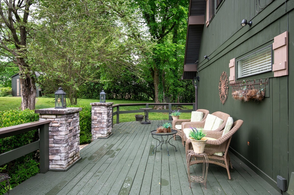 205 Allen Road Goodlettsville, TN 37072 - Photo 5 of 43 a patio with wooden floor and barbeque oven