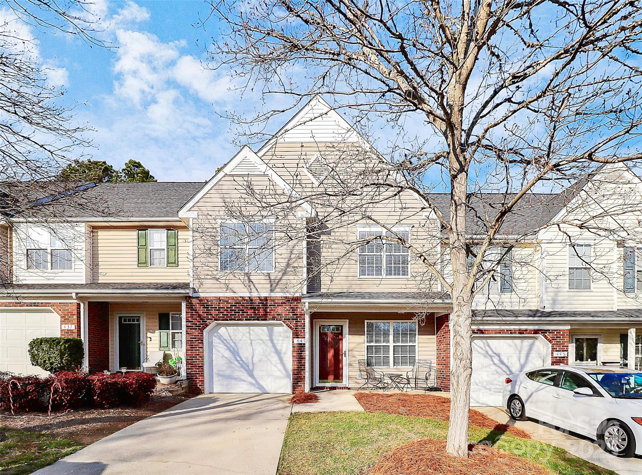 441 Robin Reed Court Pineville, NC 28134 - Photo 1 of 33 a view of a white house with large tree