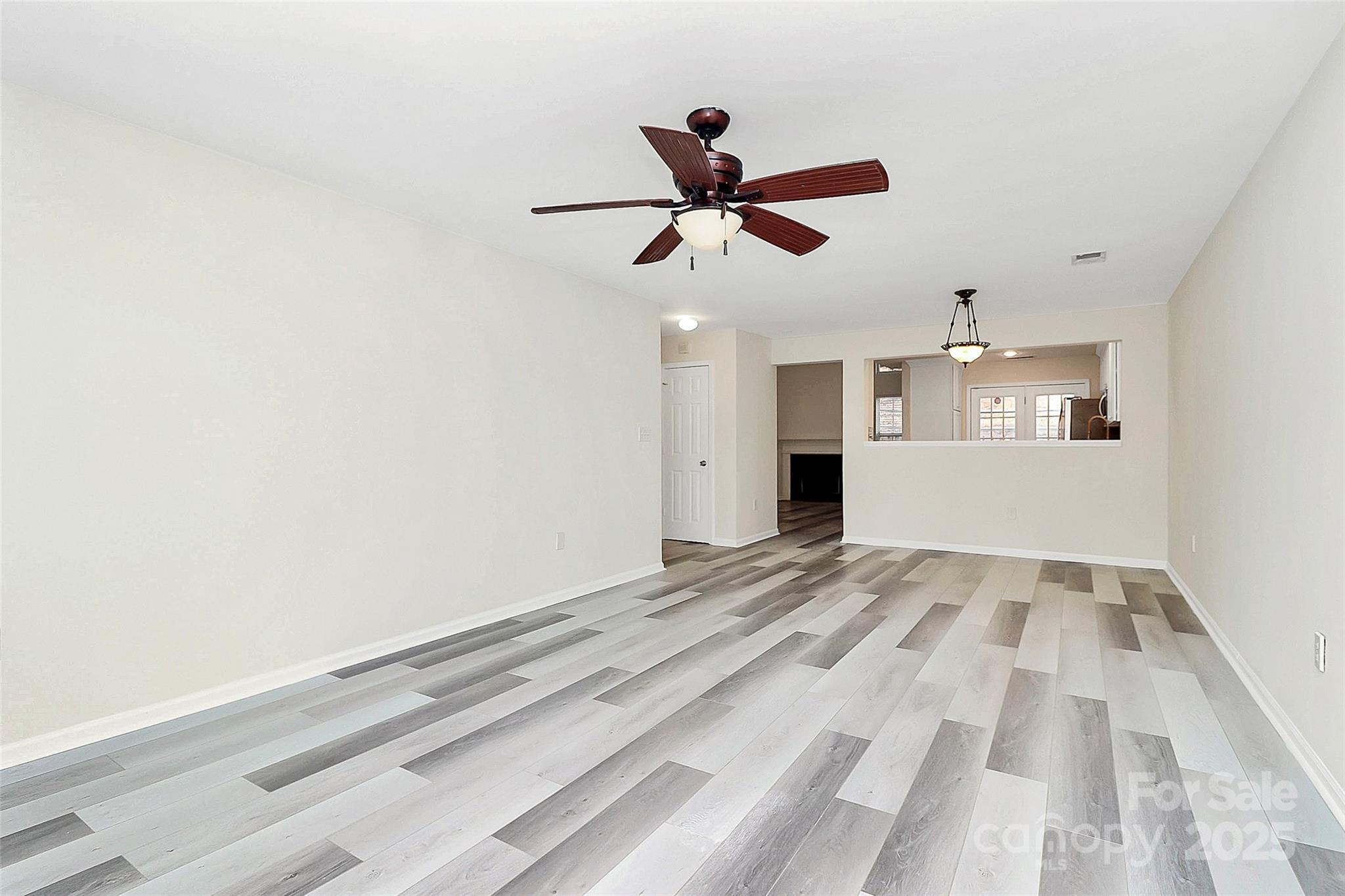 441 Robin Reed Court Pineville, NC 28134 - Photo 11 of 33 a view of an empty room and window