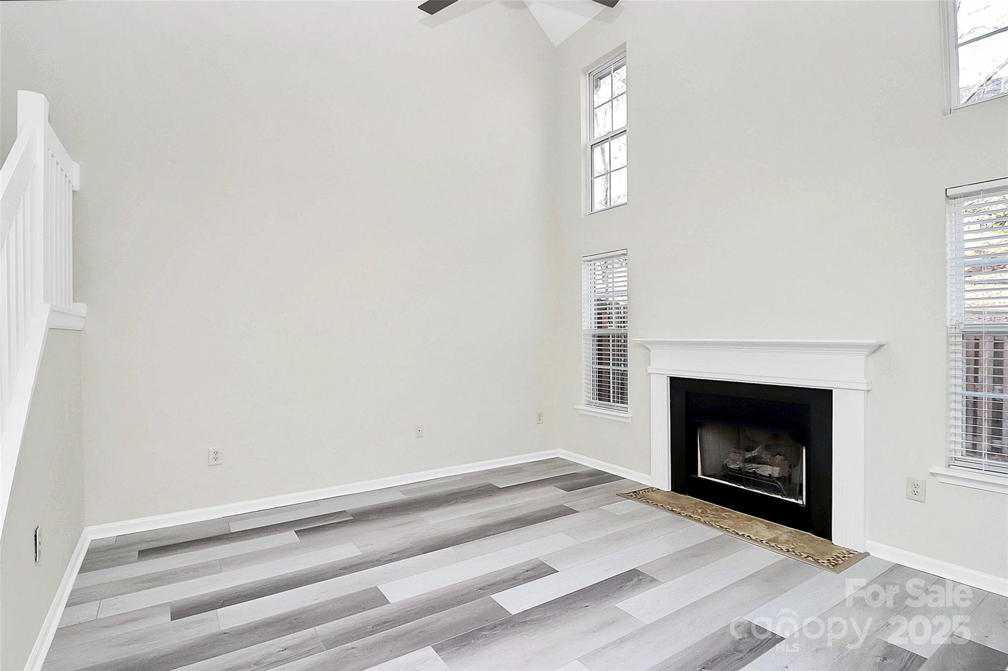 441 Robin Reed Court Pineville, NC 28134 - Photo 15 of 33 a room with a fireplace