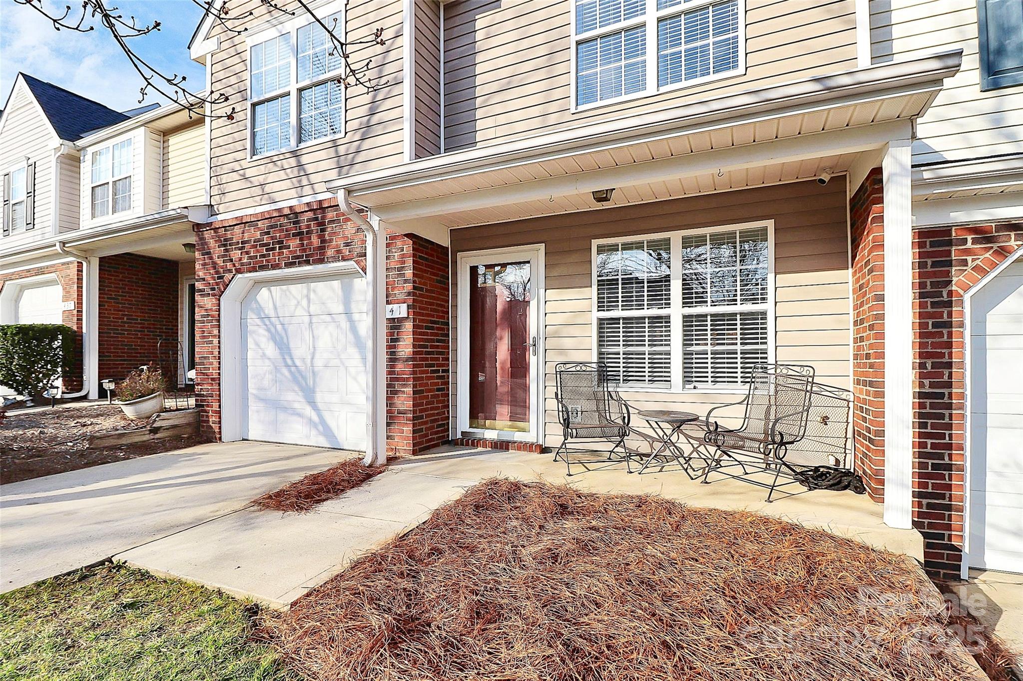 441 Robin Reed Court Pineville, NC 28134 - Photo 2 of 33 a front view of a building with a outdoor space