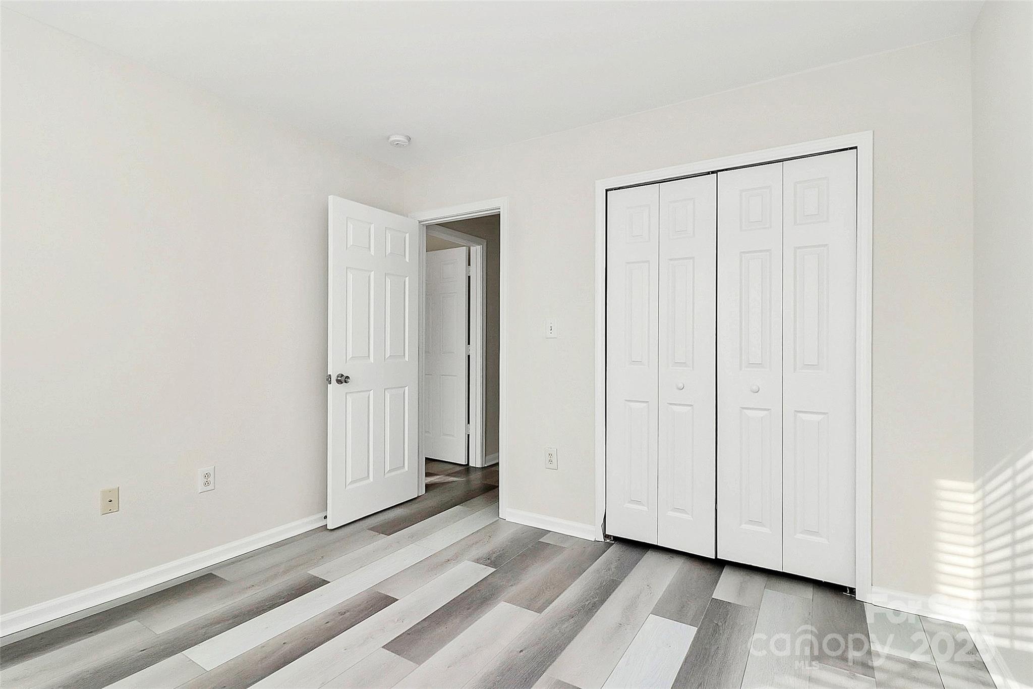441 Robin Reed Court Pineville, NC 28134 - Photo 25 of 33 a view of a room with wooden floor and entryway