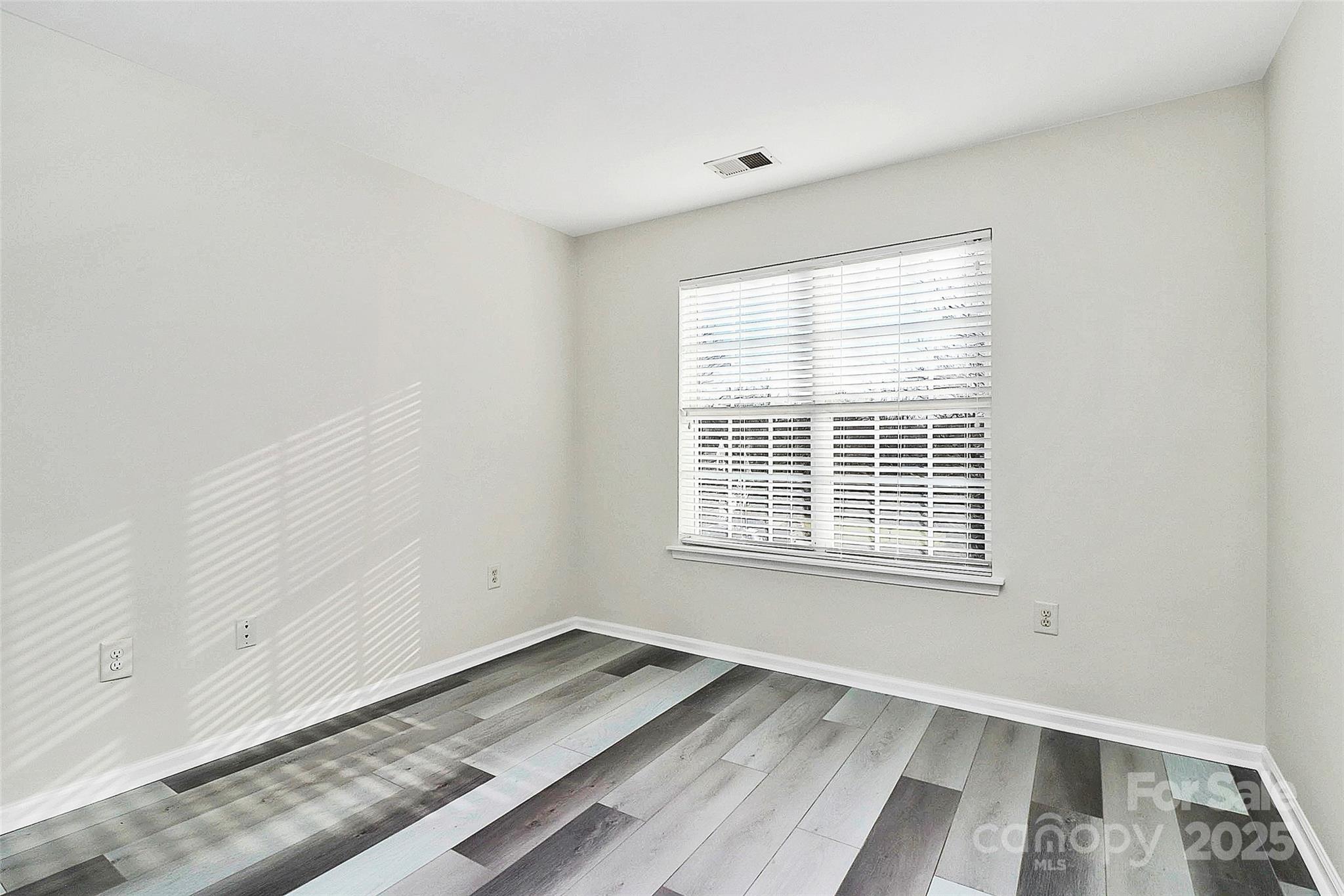441 Robin Reed Court Pineville, NC 28134 - Photo 26 of 33 an empty room with a window