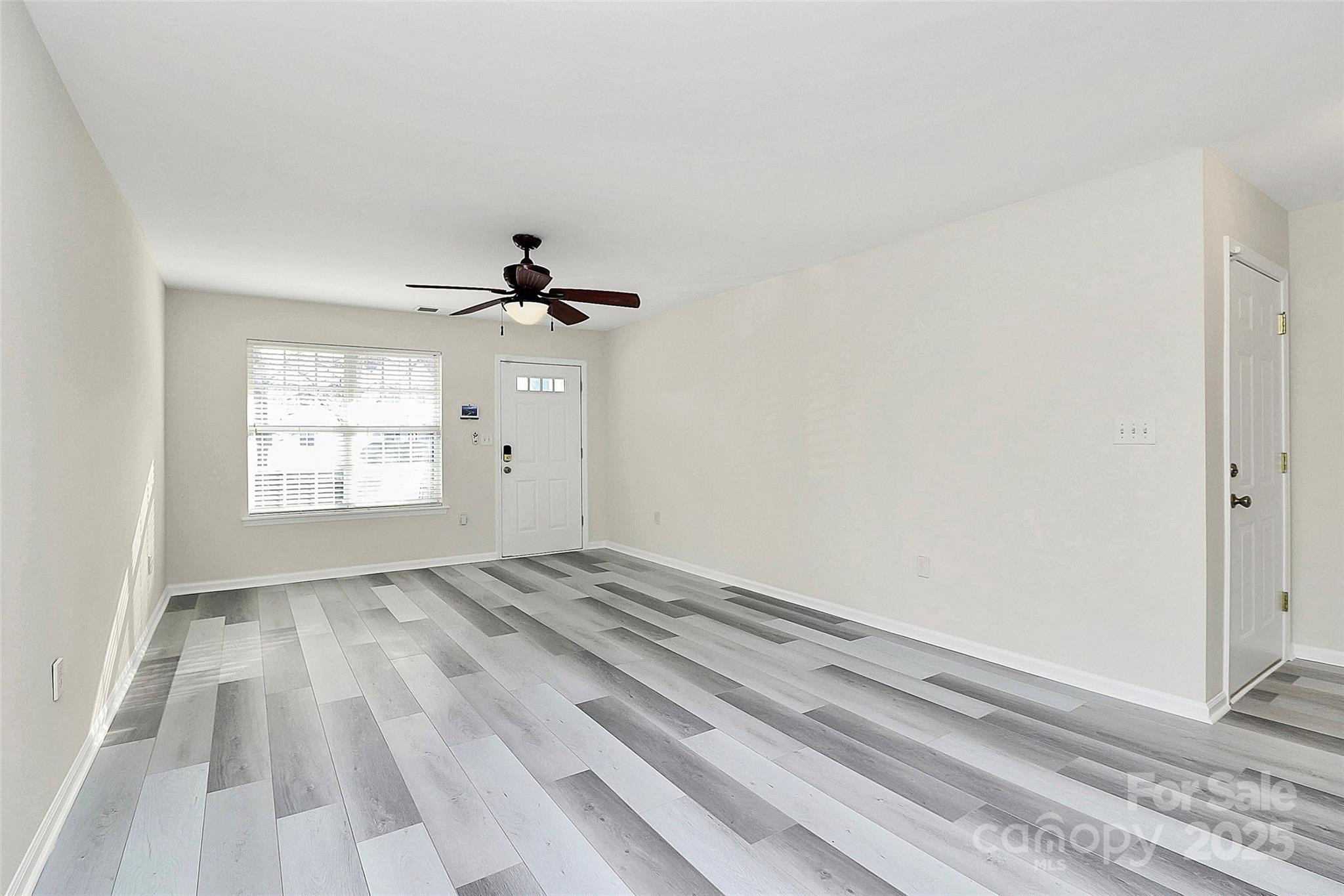 441 Robin Reed Court Pineville, NC 28134 - Photo 9 of 33 a view of empty room with window